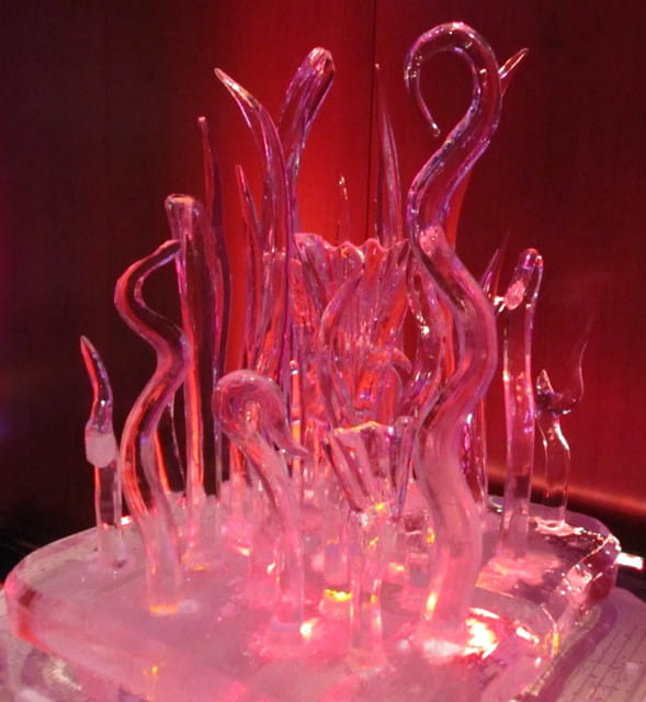 Red illuminated flame ice sculpture
