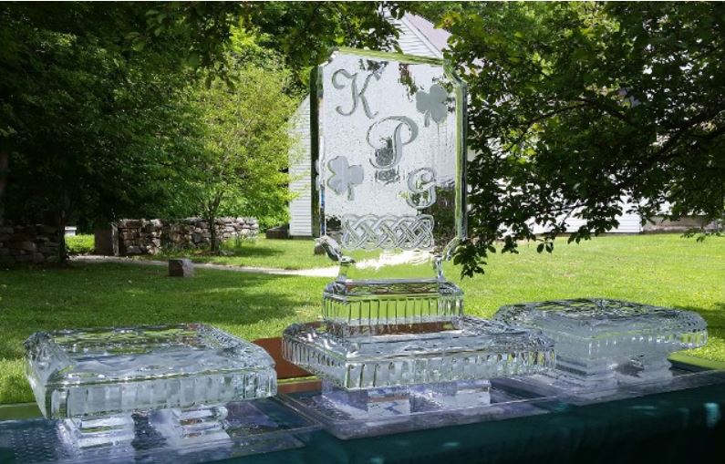 Monogram wedding ice sculpture outdoors