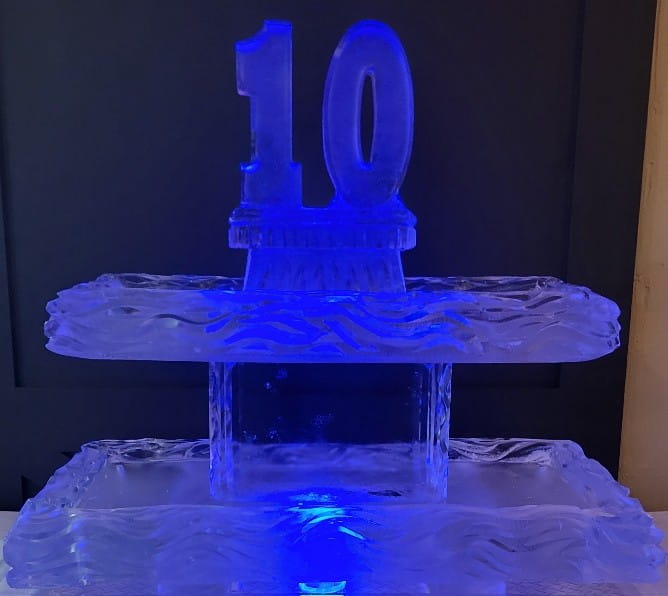Illuminated number 10 ice sculpture centerpiece