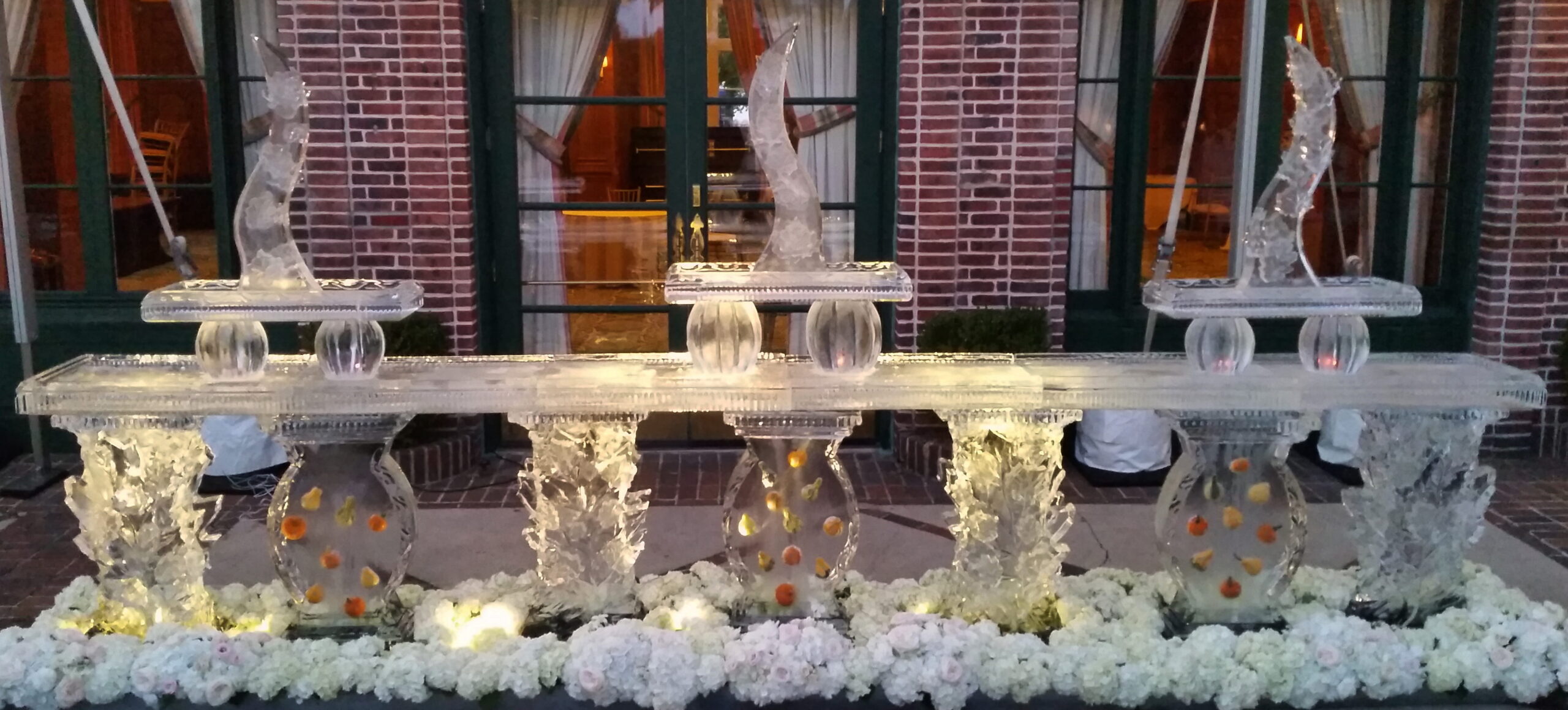 Tiered ice fountain sculpture for wedding reception