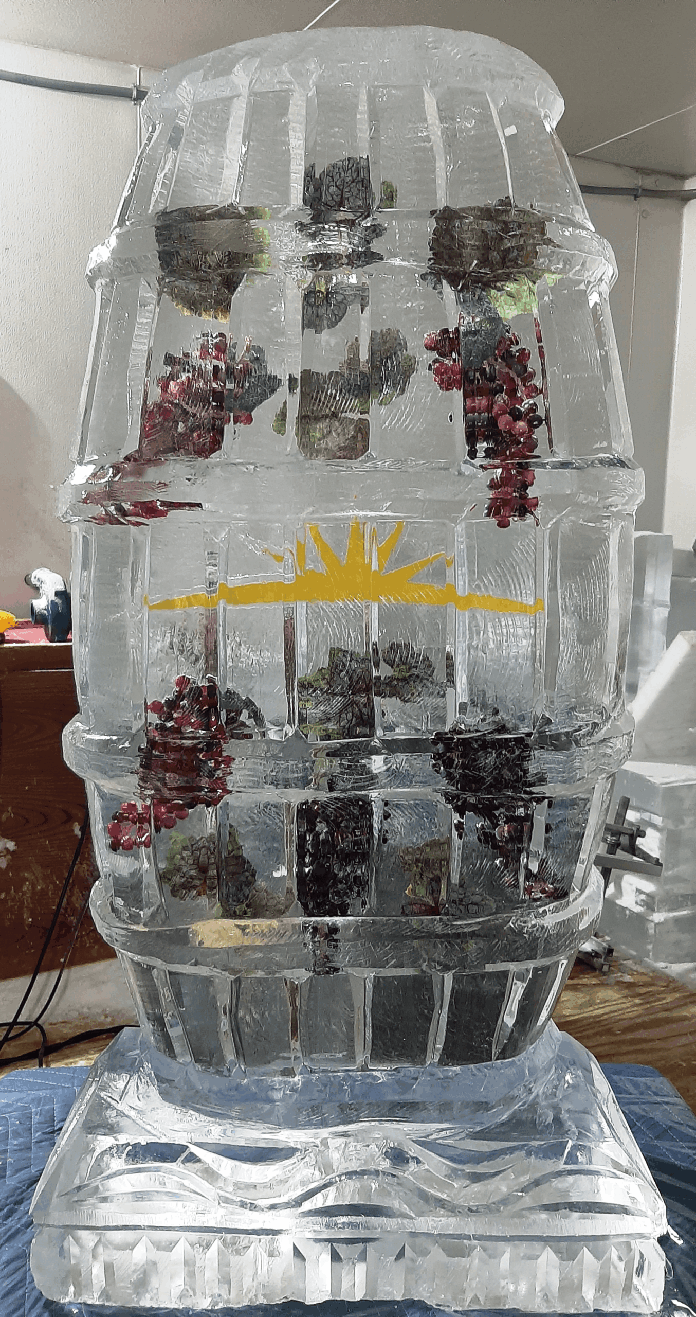 Chilled seafood tower ice display featuring fresh lobsters and crabs