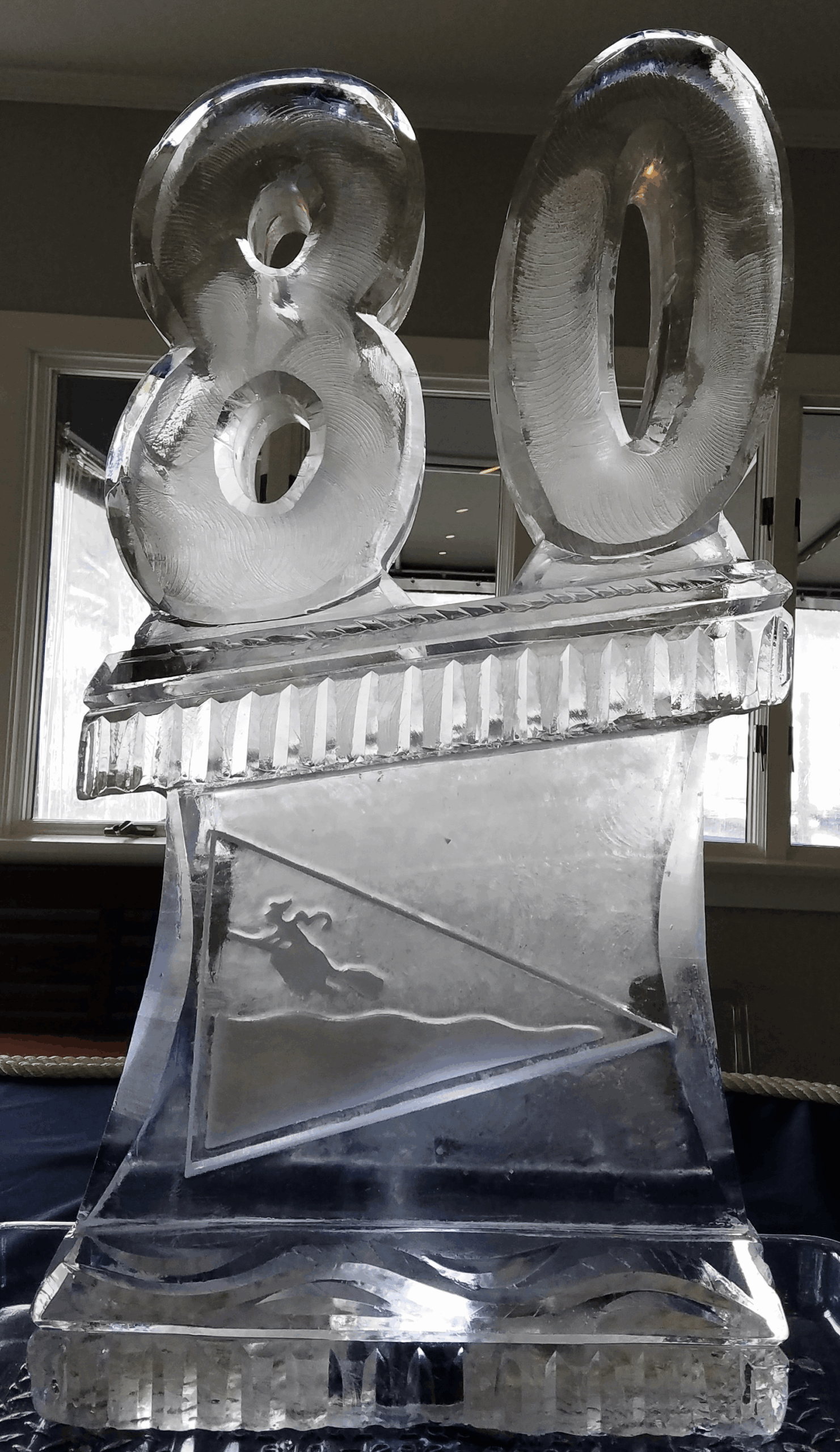 Illuminated lion head ice sculpture