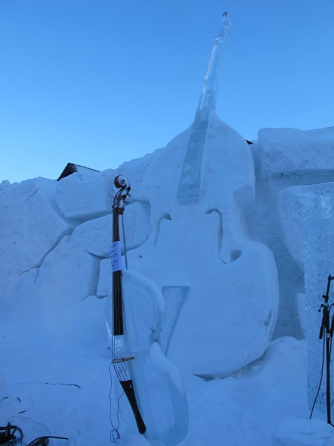 Detailed look at massive geometric structural snow blocks built outdoors in winter