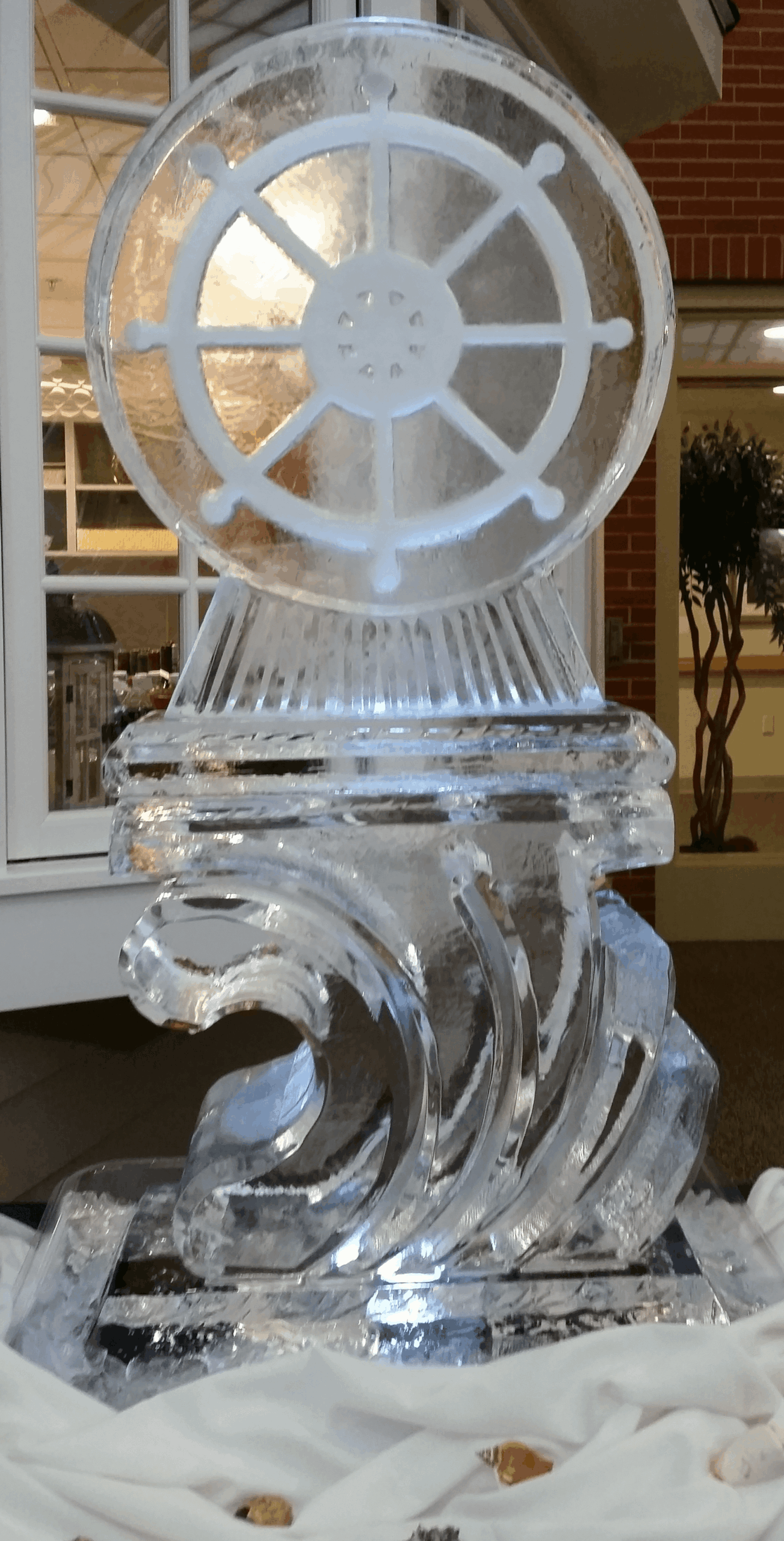 Decorative circular ice sculpture centerpiece