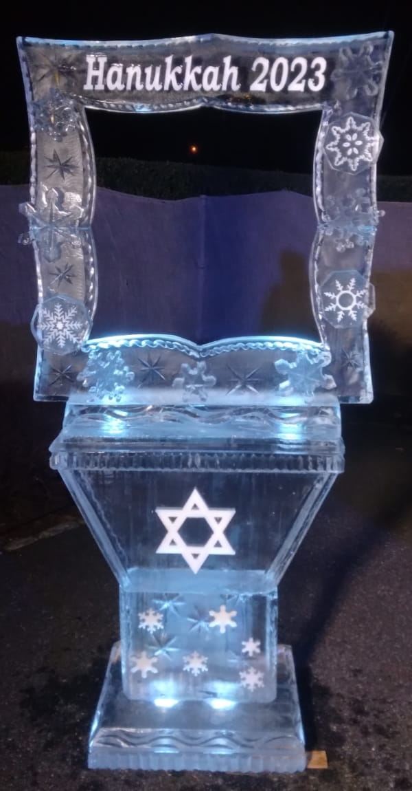 Ice bar with illuminated snowflake engraving