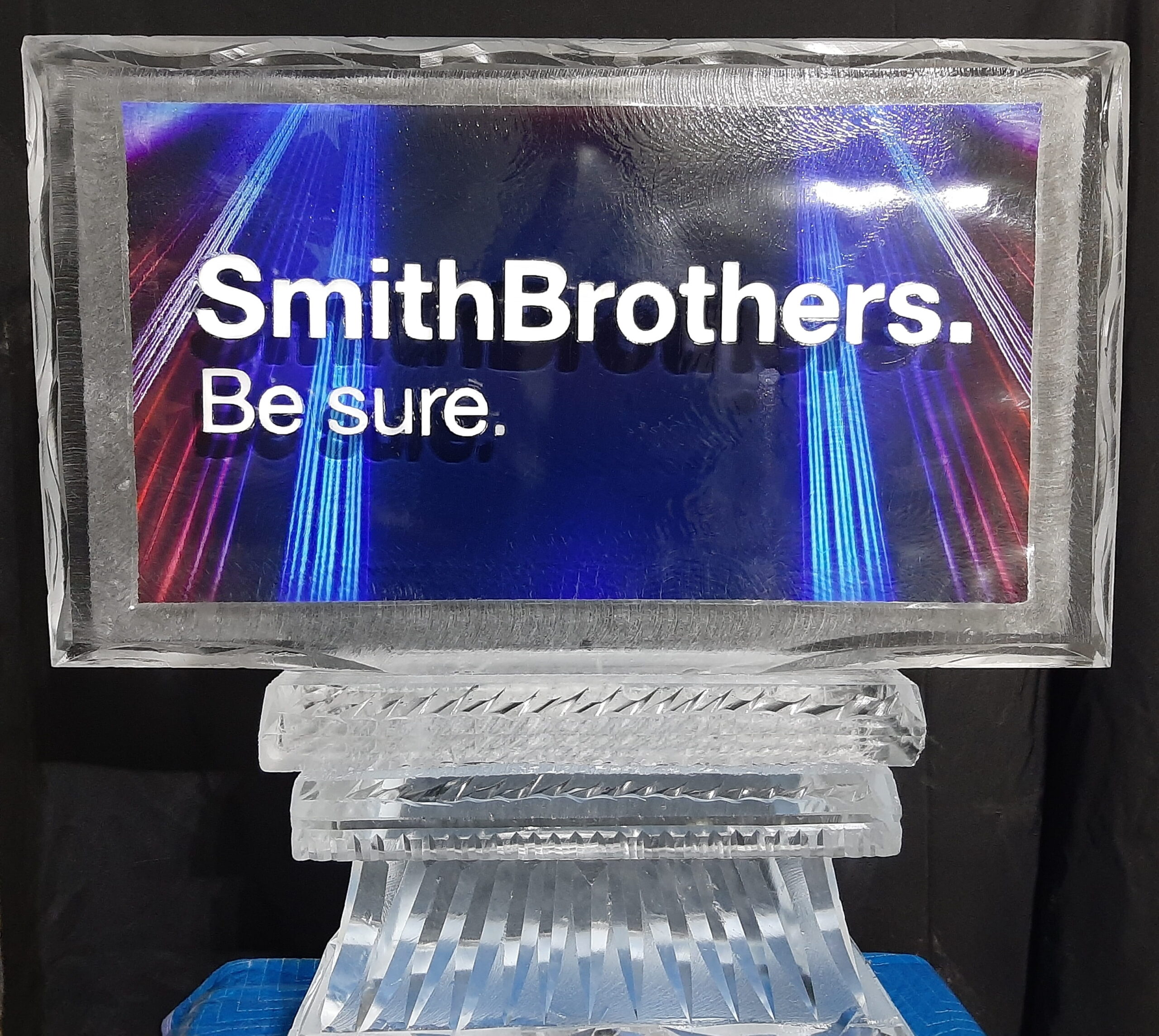 SmithBrothers Be Sure corporate branding ice sculpture with deep blue lighting