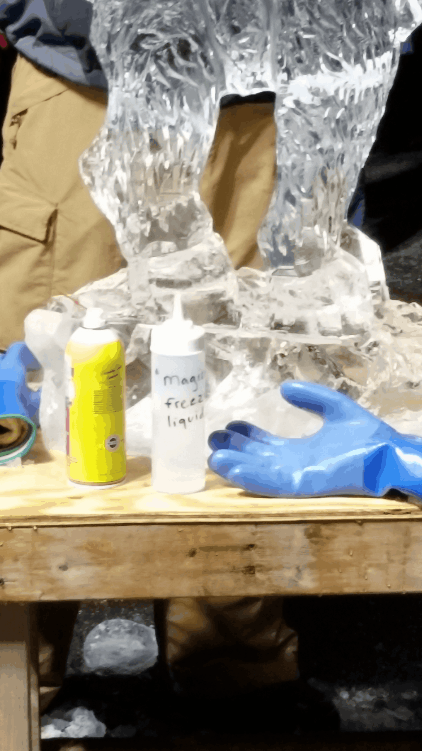 Table layout showing bottles and carving tools prepped for an event demonstration