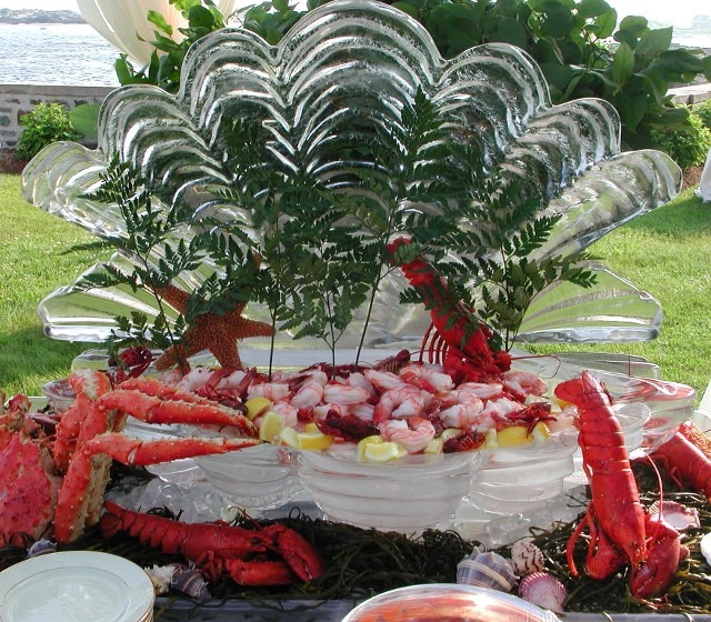 Intricate fan style floral design custom ice carving centerpiece layout