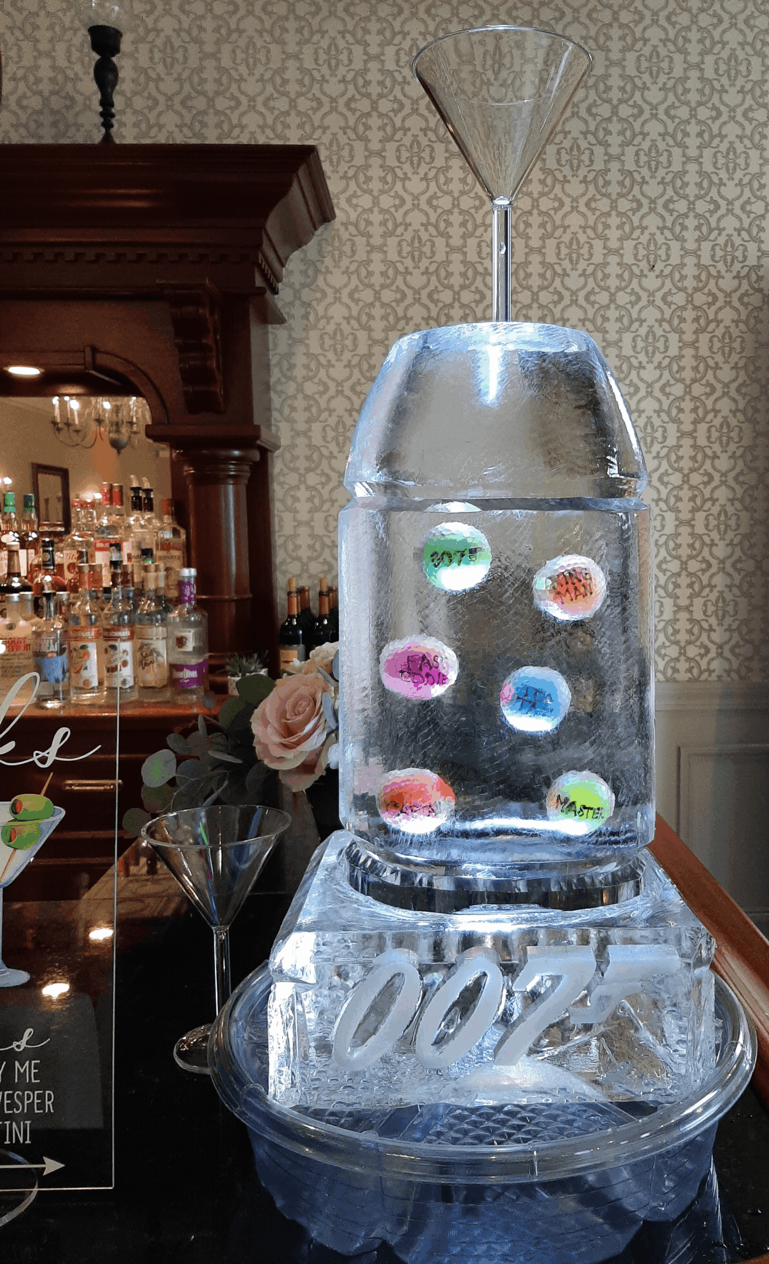 Ice drink display with illuminated shelves