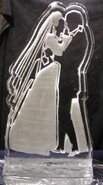 Swan-shaped ice sculpture with graceful carved design