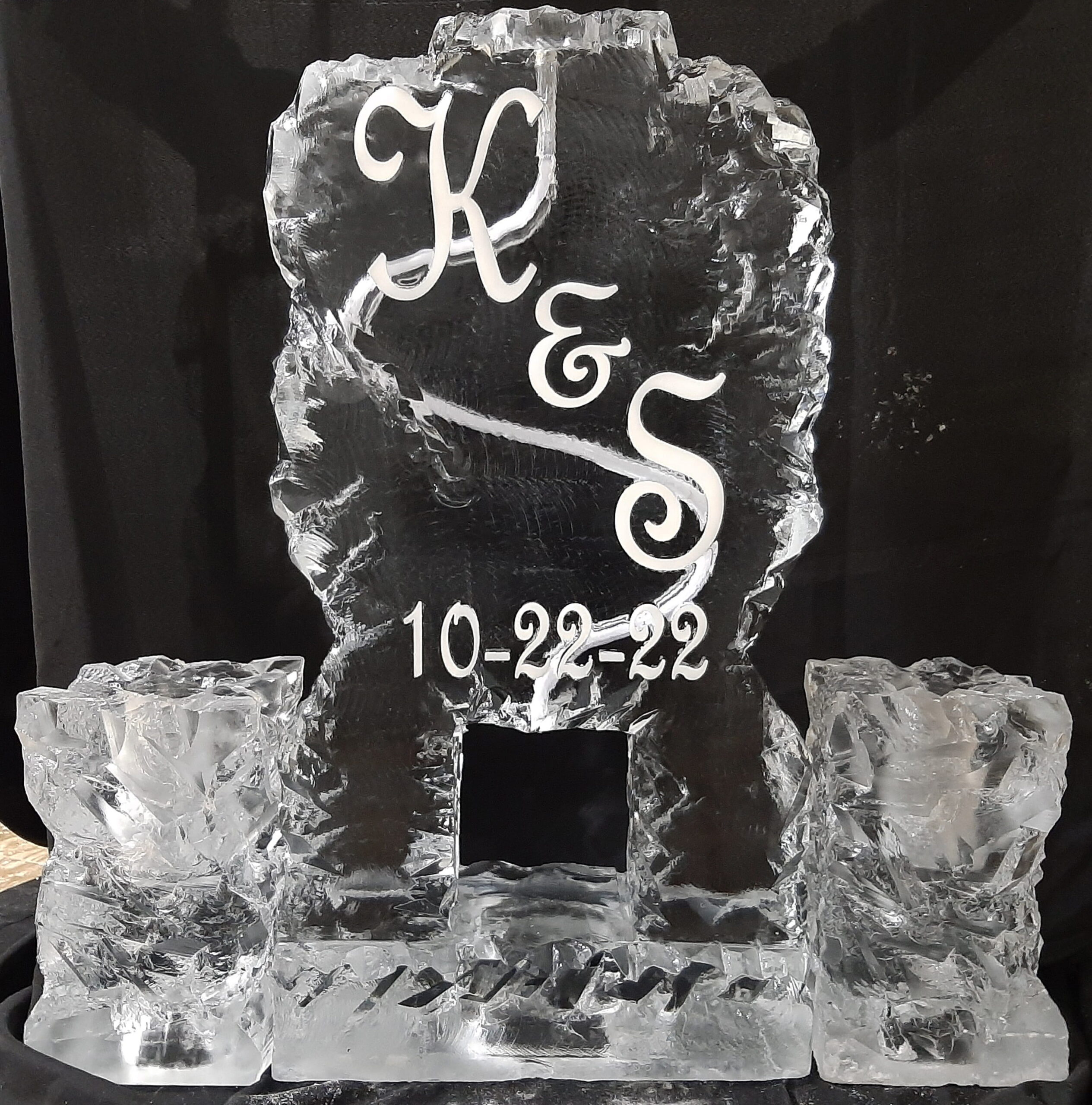 Personalized anniversary ice sculpture with engraved initials and date
