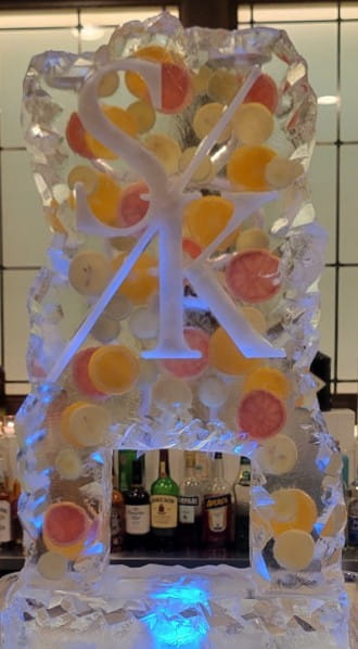 Colorful decorative monogram ice sculpture with artistic initials