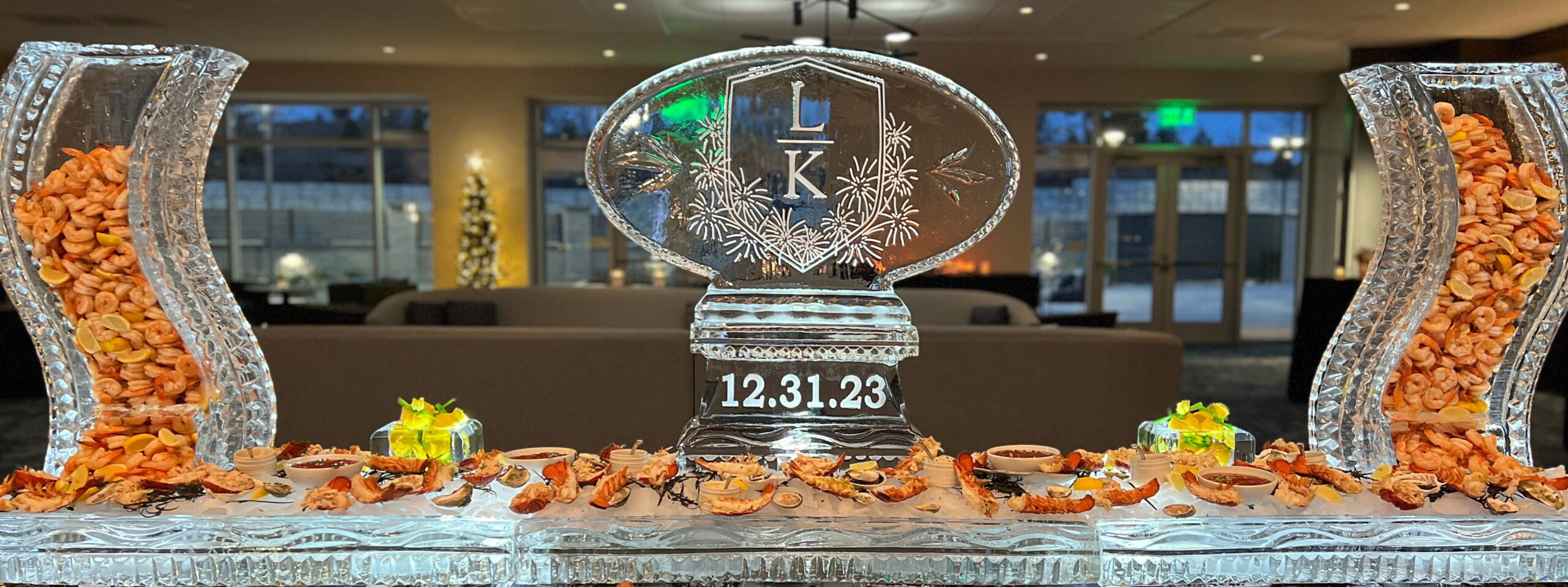 Illuminated corporate logo ice sculpture centerpiece