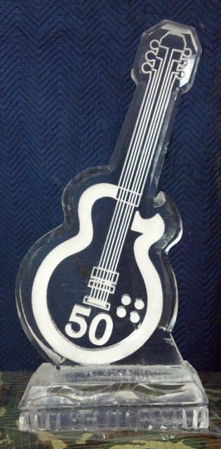 Guitar-shaped custom ice sculpture