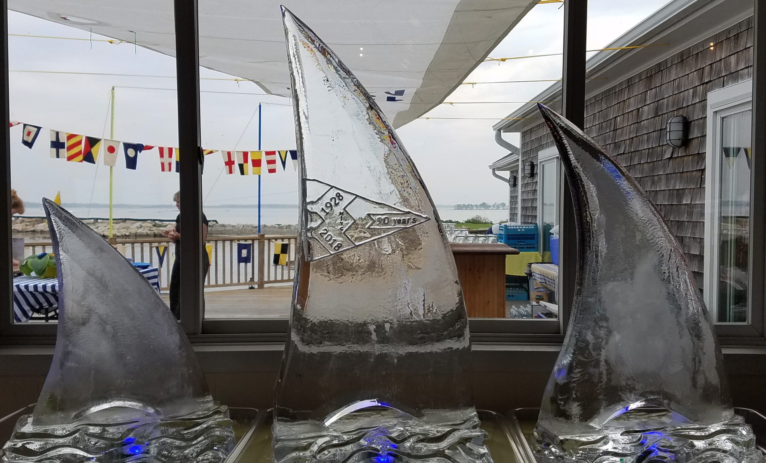 100th anniversary illuminated ice fireplace sculpture