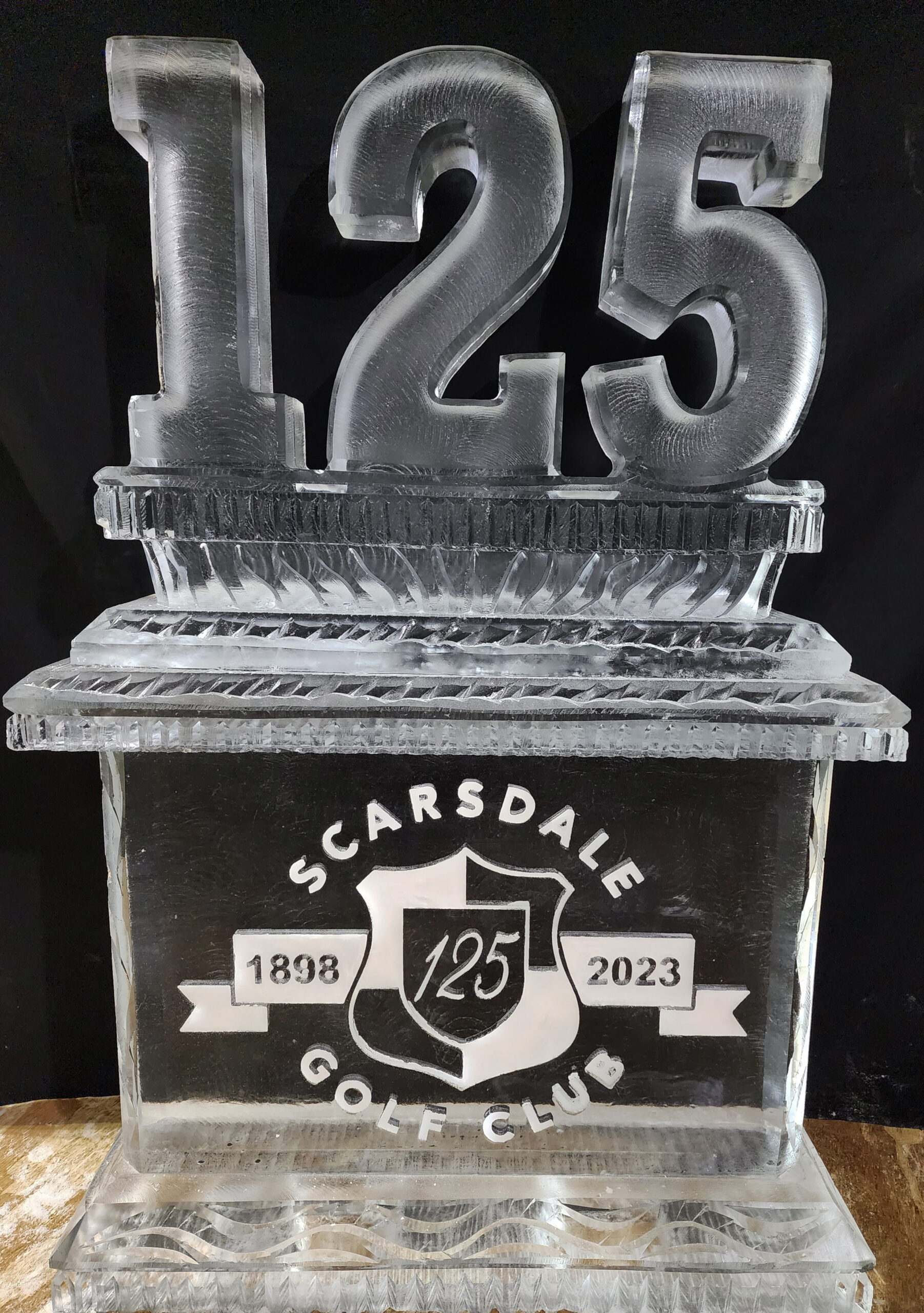 125 milestone carved ice sculpture