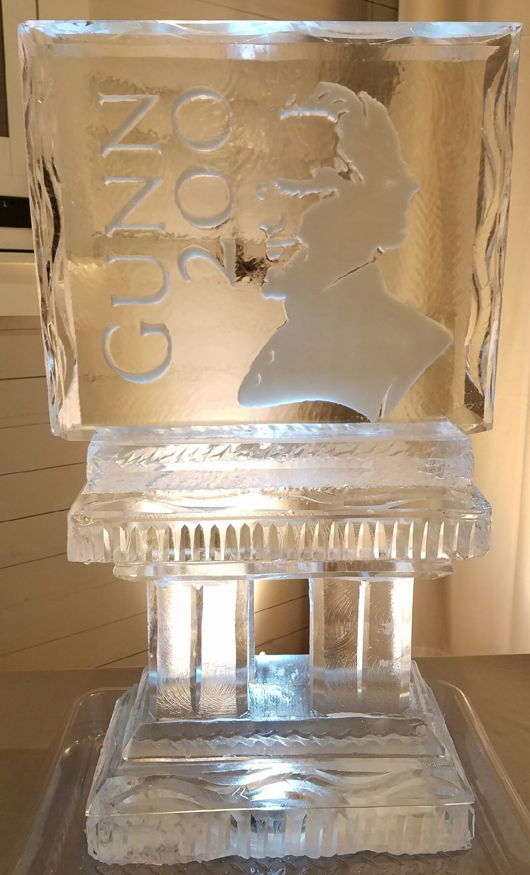 Gold star engraved ice sculpture