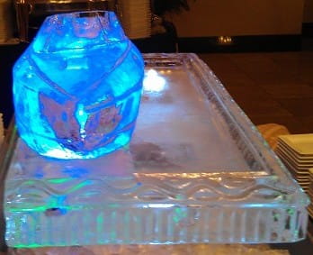 Illuminated blue gemstone ice sculpture