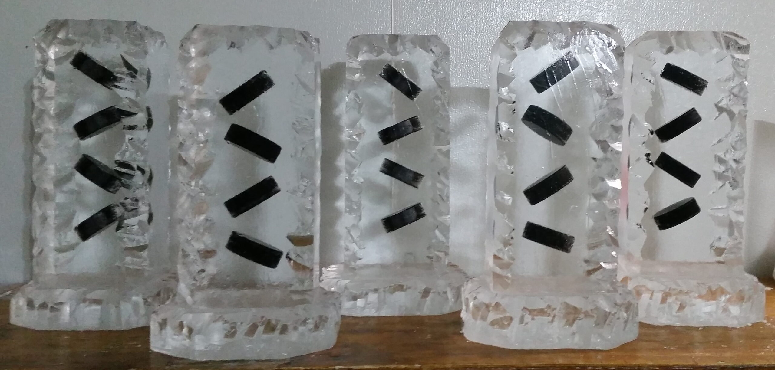 Modern geometric ice sculpture with cutout design