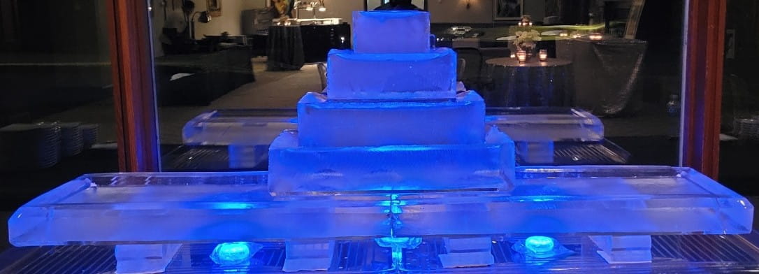 Blue illuminated tiered ice cake display