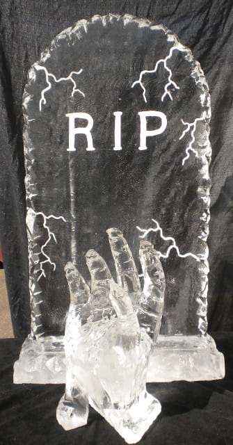 Cracked Headstone with Hand