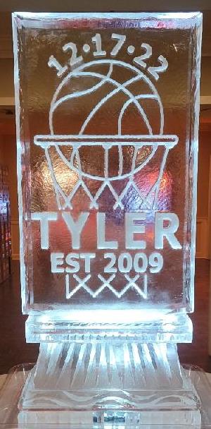 Basketball hoop with Tyler EST. 2009 ice sculpture