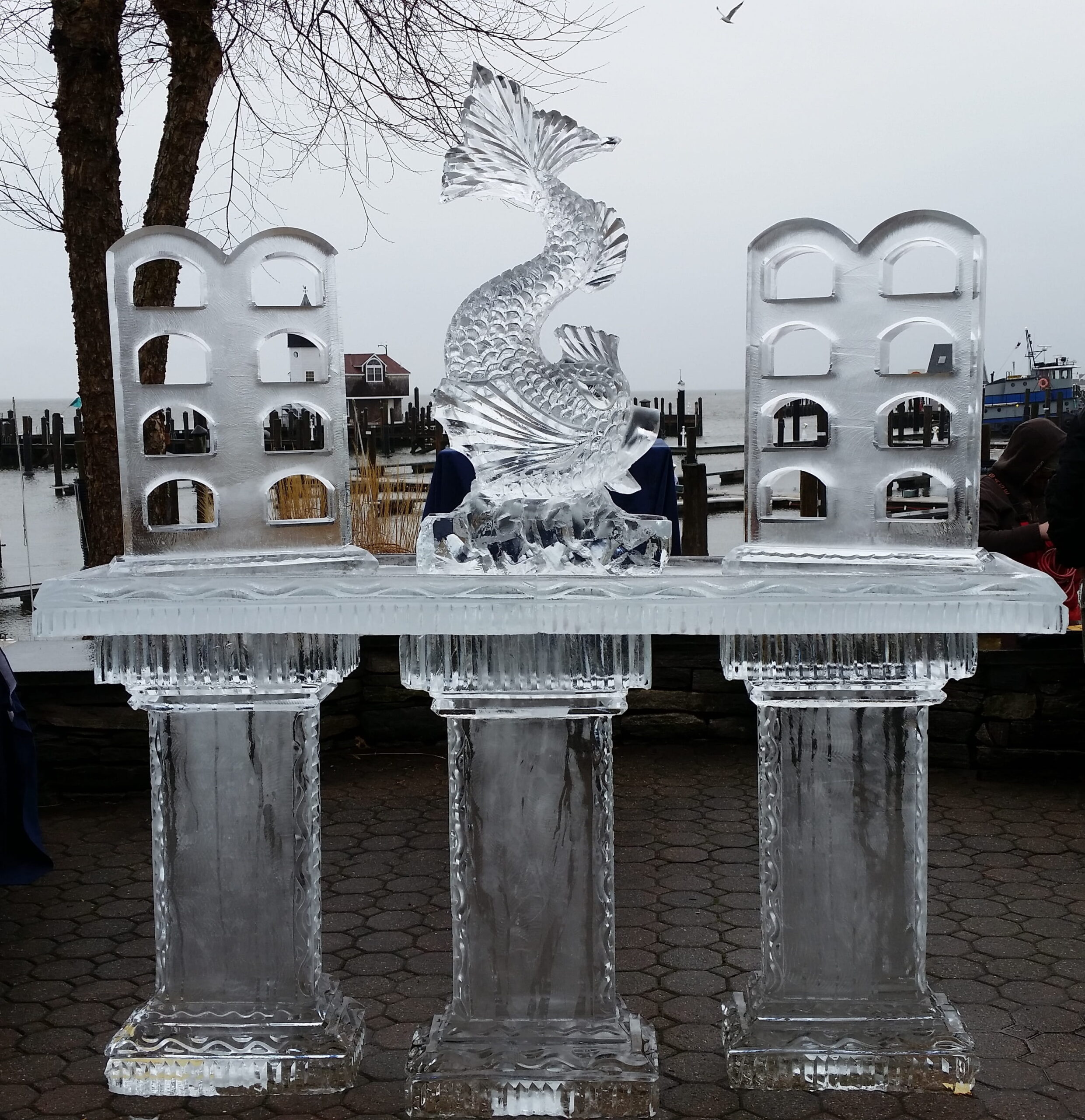 Outdoor ice bar with swan sculpture