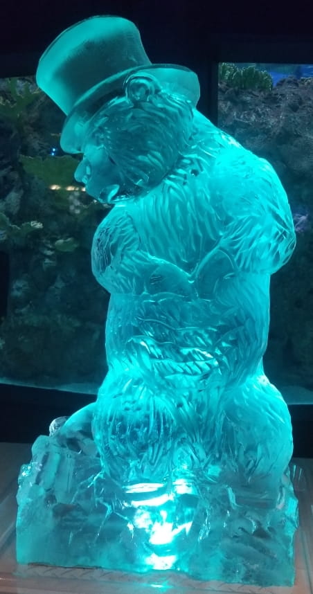 Blue illuminated horse head ice sculpture