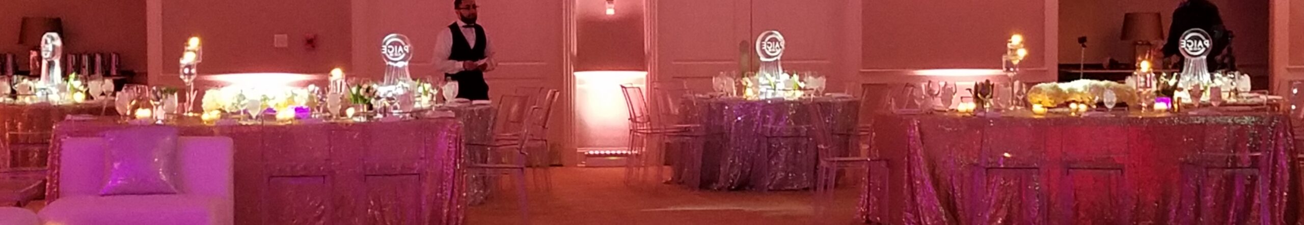 Event ballroom with illuminated ice sculptures