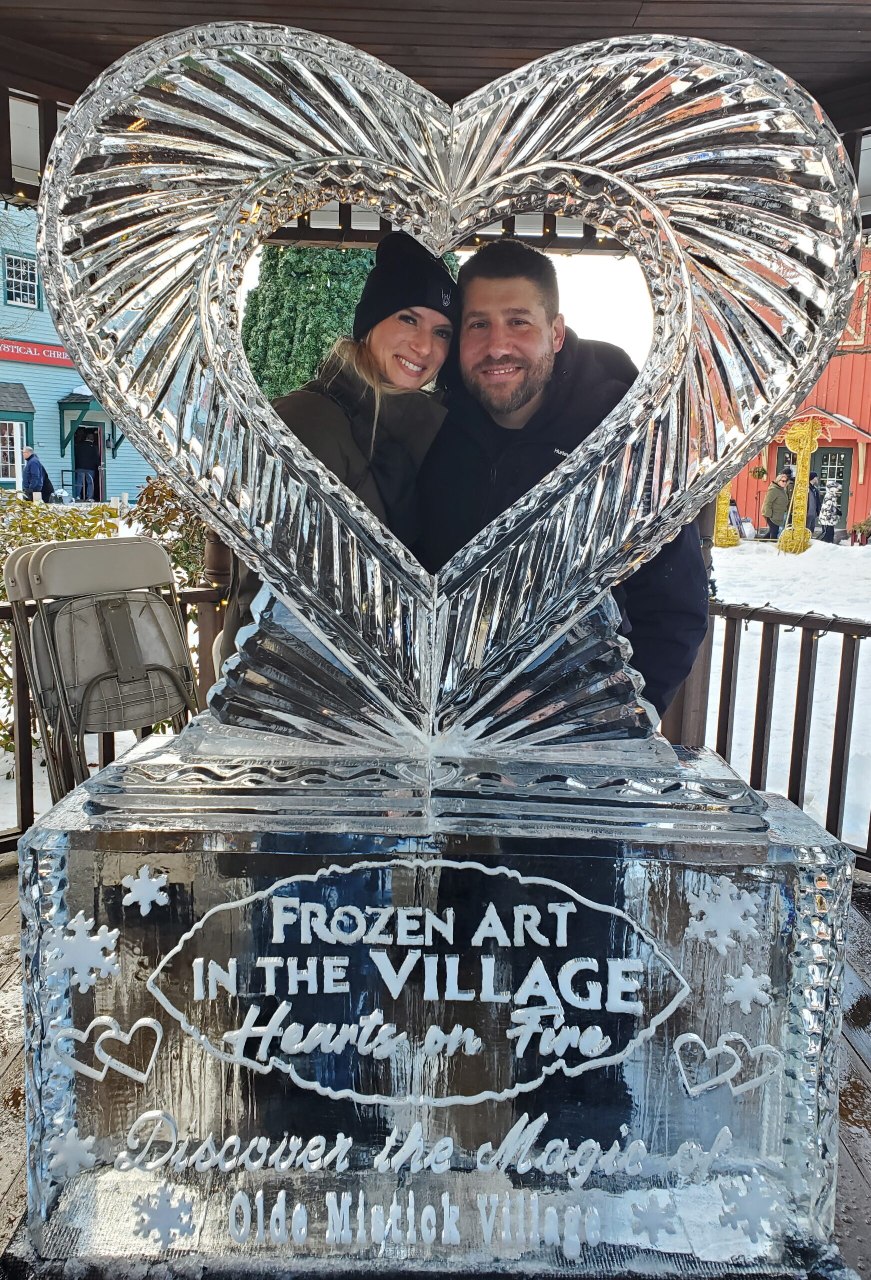 Custom ice sculpture frame featuring an embedded photo of a couple
