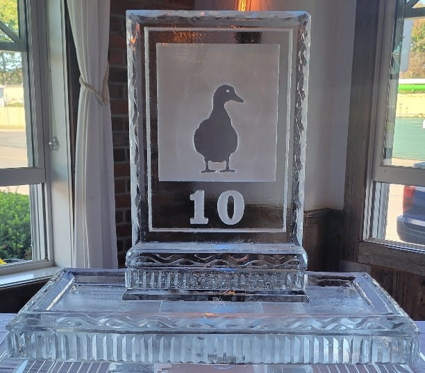 Custom engraved award ice sculpture with bird silhouette