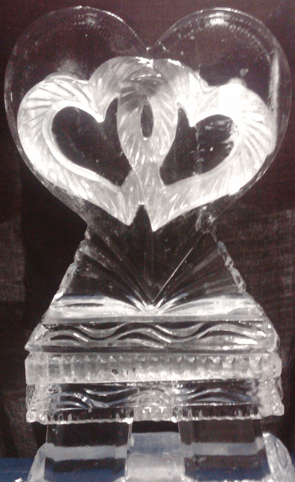 Sleek modern interlocking double hearts ice sculpture