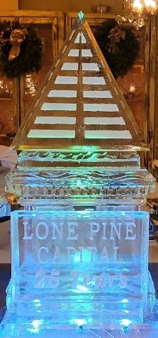 Tiered ice bar display stand illuminated with green and yellow LED lights