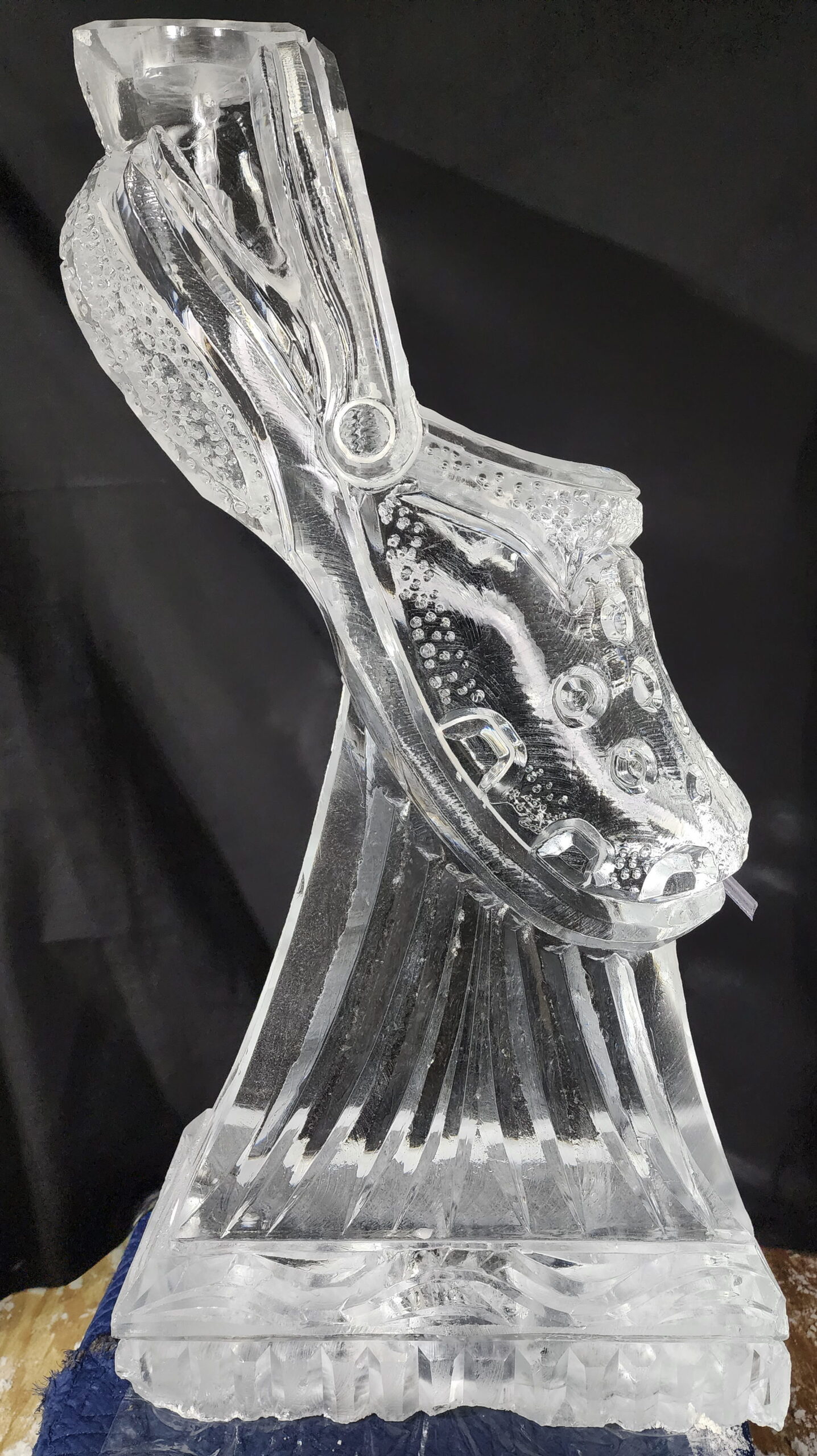 Ice sculpture featuring engraved shoe design
