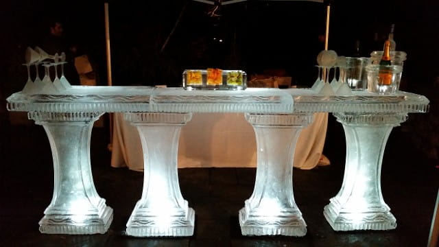 Cocktail serving ice bar with drinks