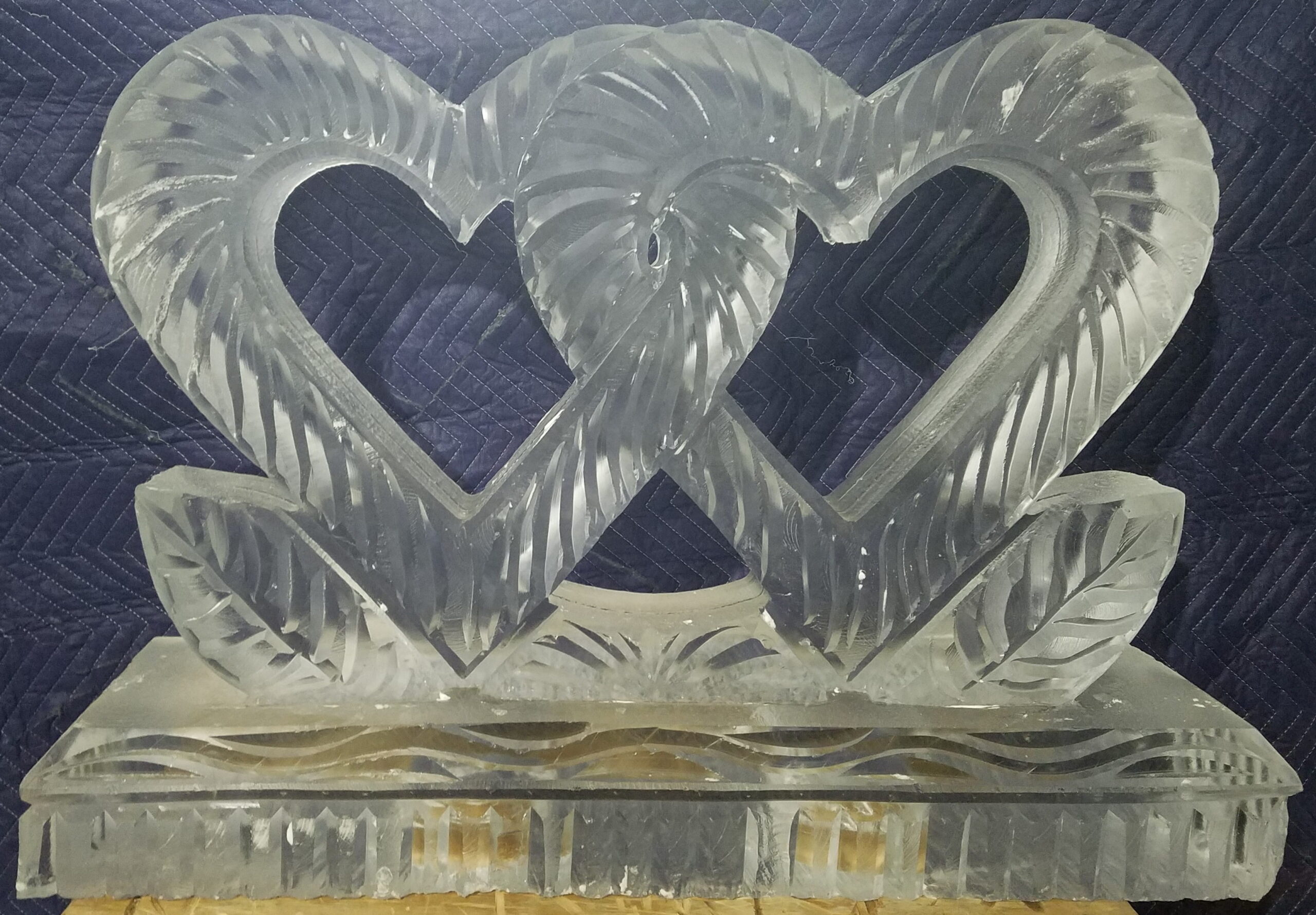 Classic interlocking double hearts clear ice sculpture