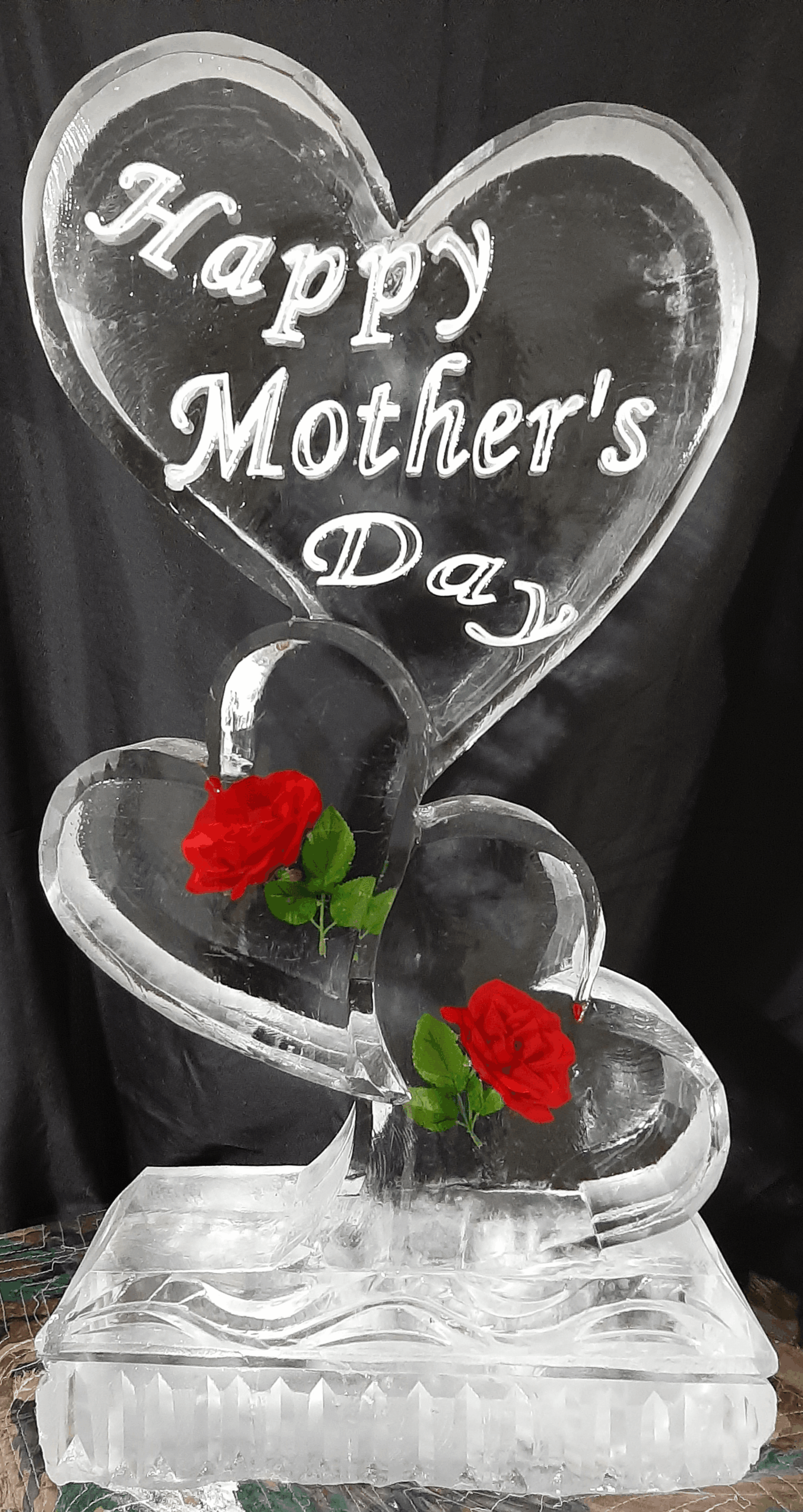 Mother's Day heart-shaped ice sculpture with rose