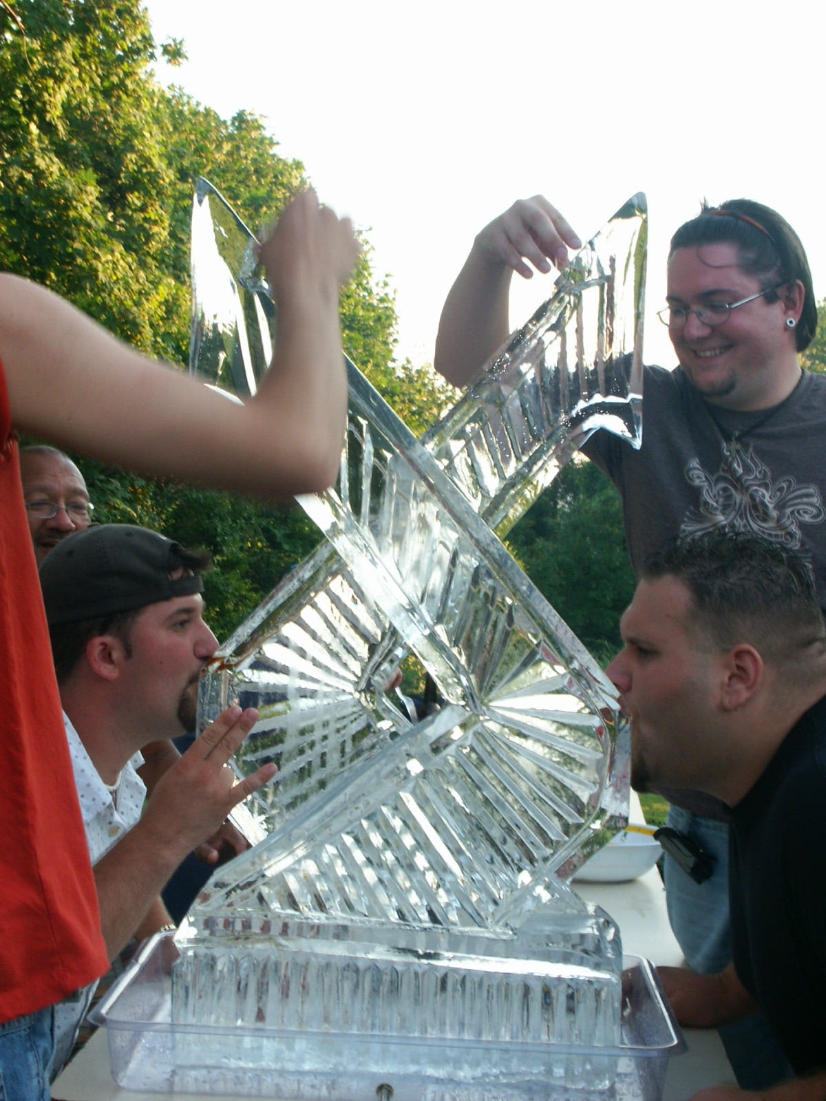 Ice carving demonstration at outdoor event