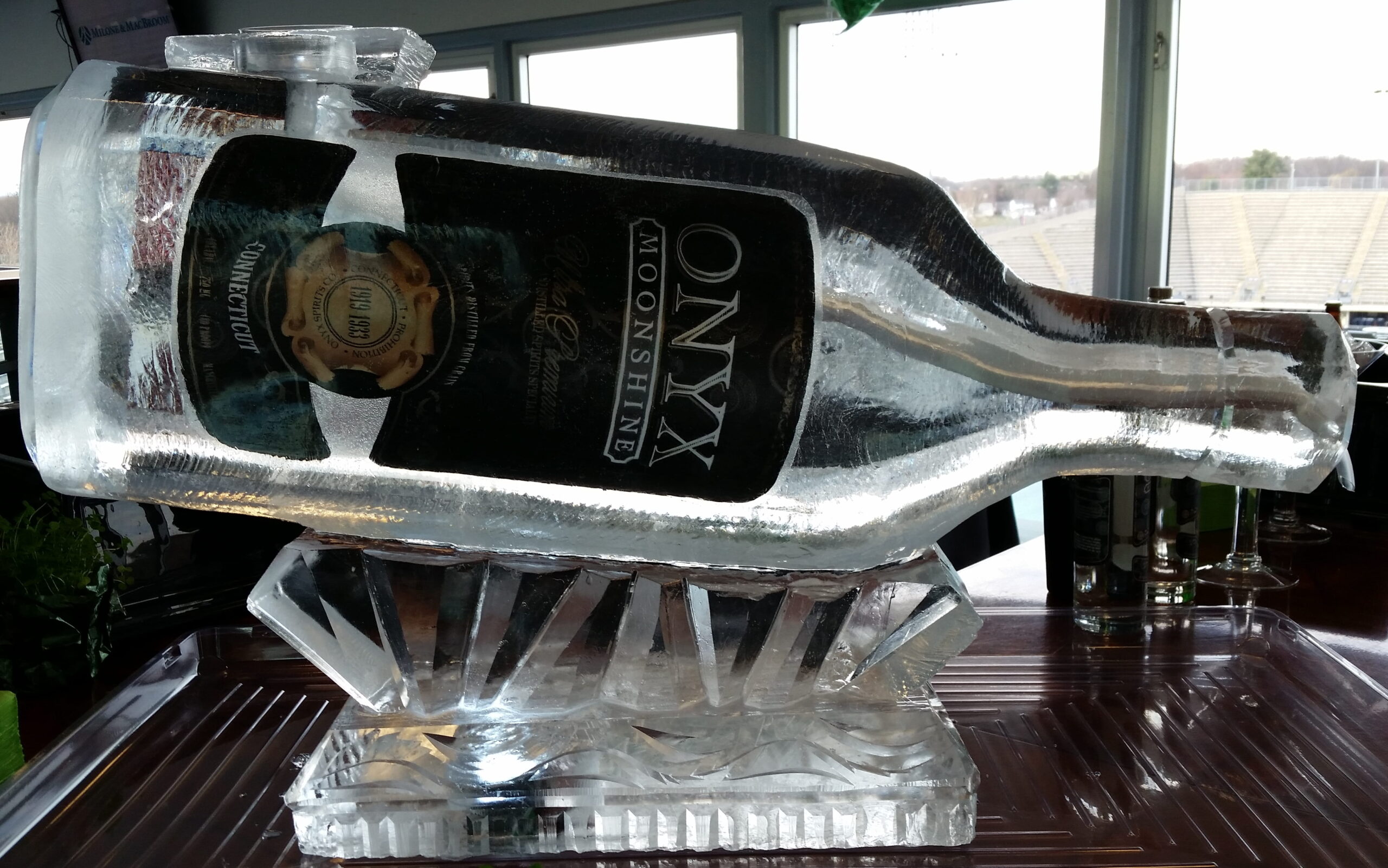 Wine bottle displayed in custom ice sculpture
