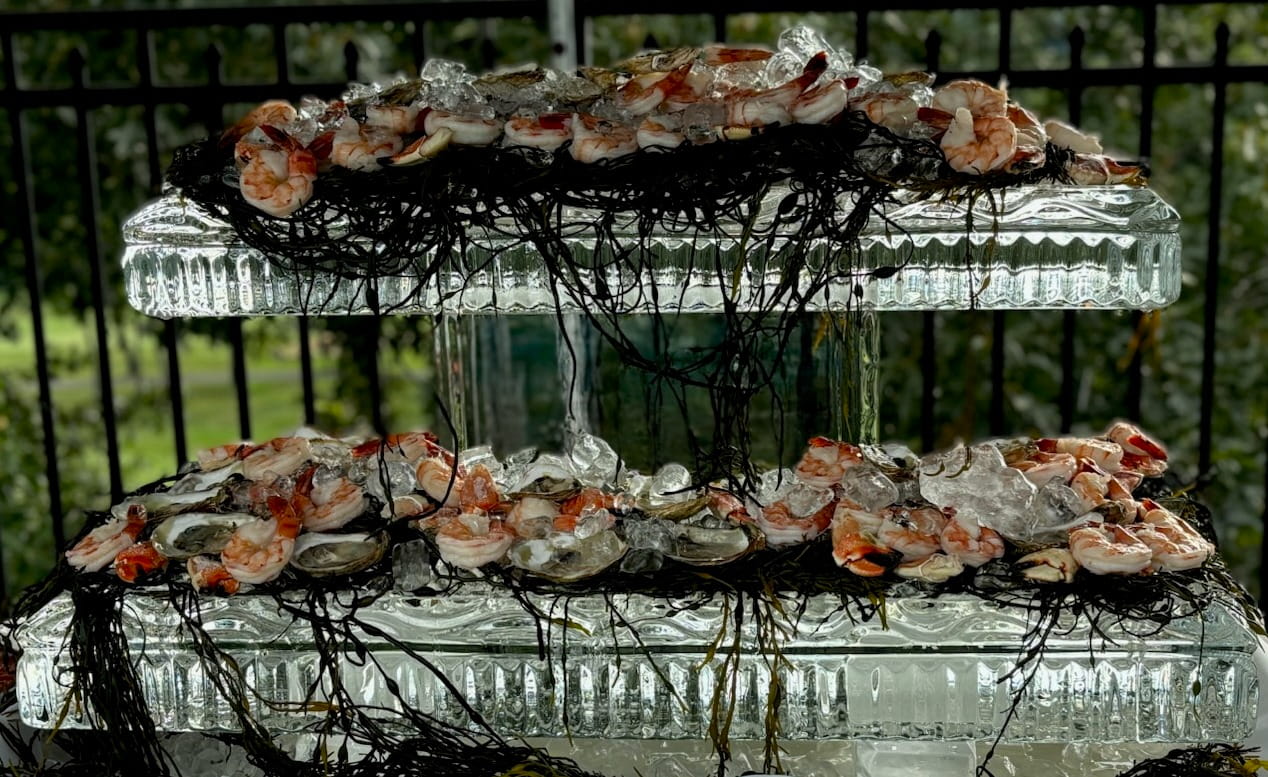 Seafood buffet displayed on custom ice sculpture