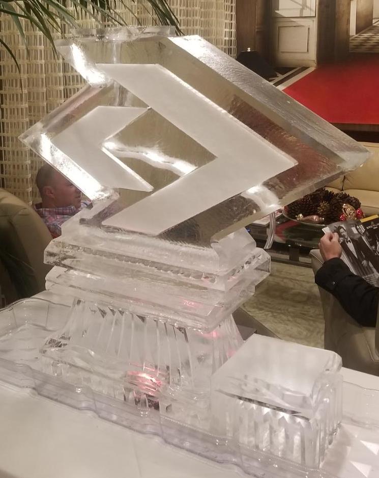 Modern geometric arrow ice sculpture centerpiece