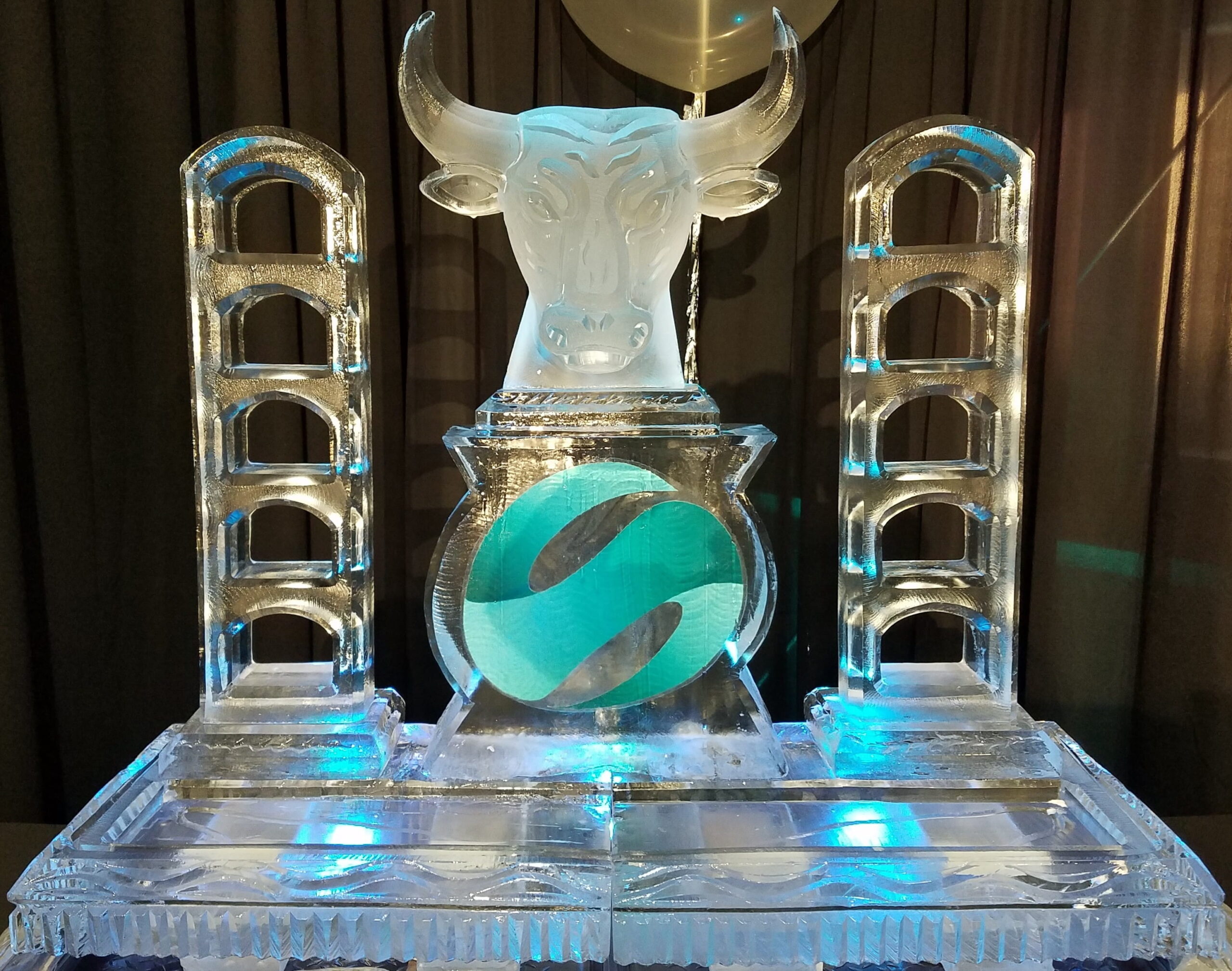 Sports-themed ice sculpture with custom logo