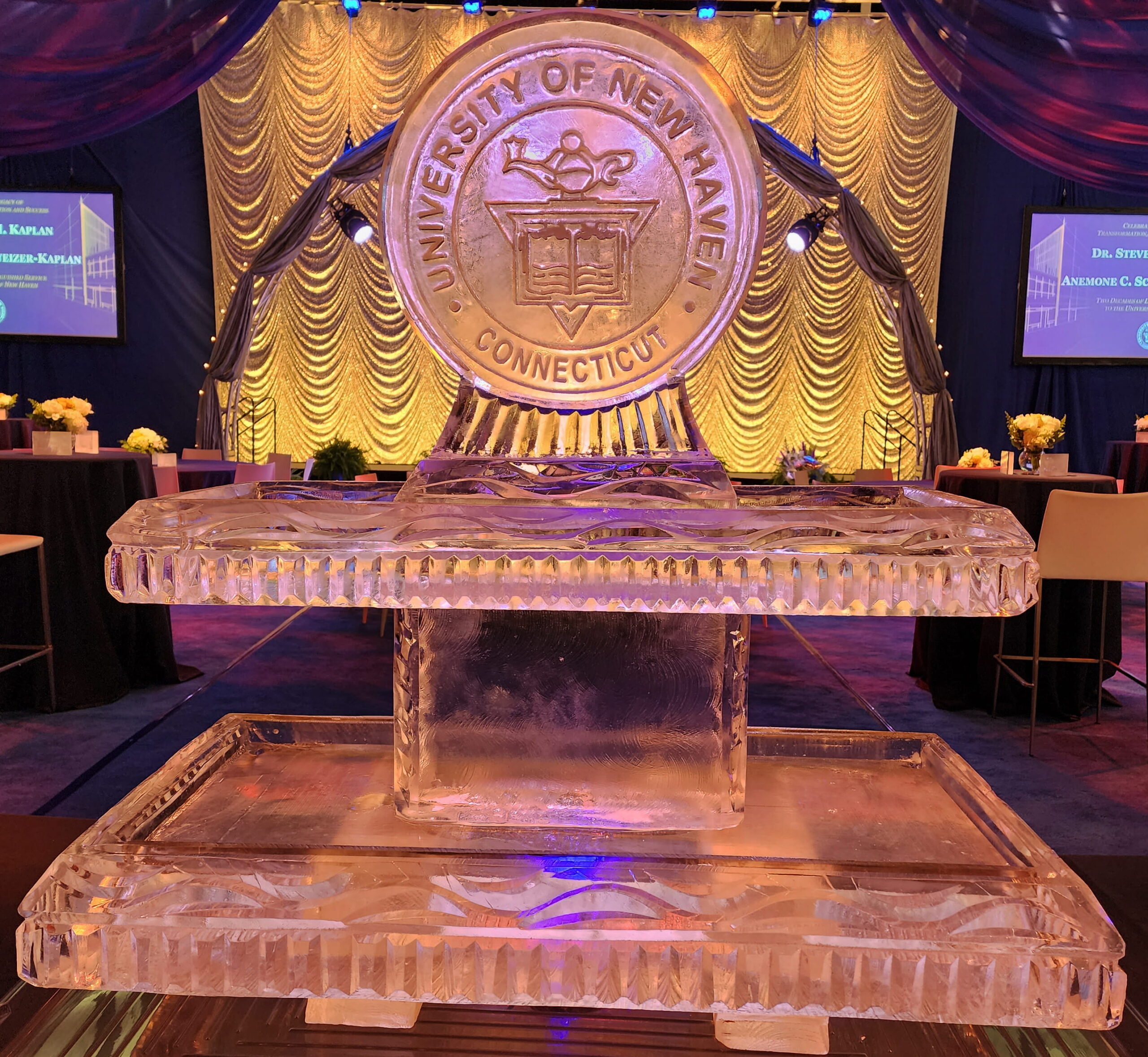 Grand illuminated corporate emblem ice sculpture
