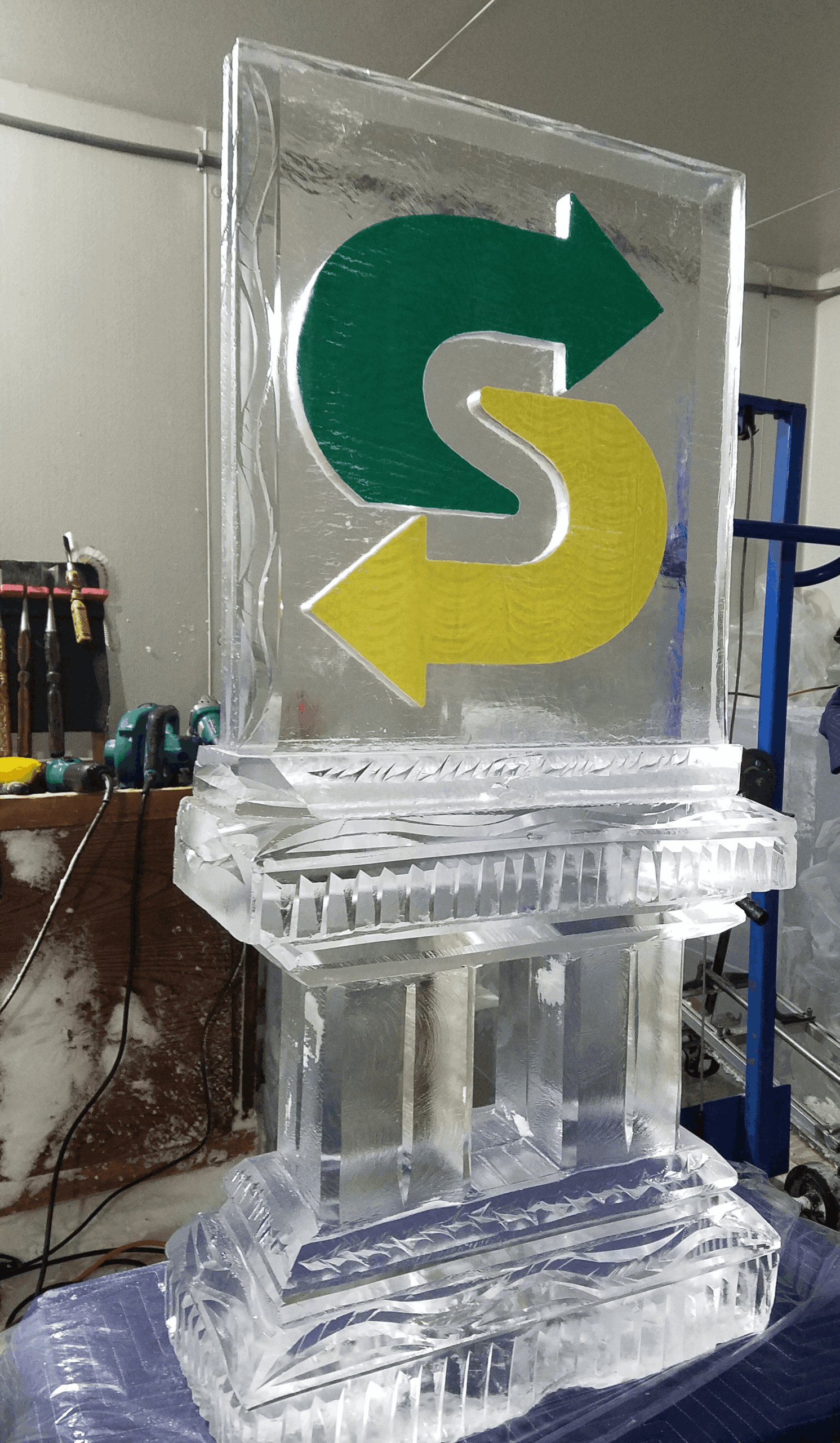 Subway restaurant corporate yellow and green logo ice sculpture display