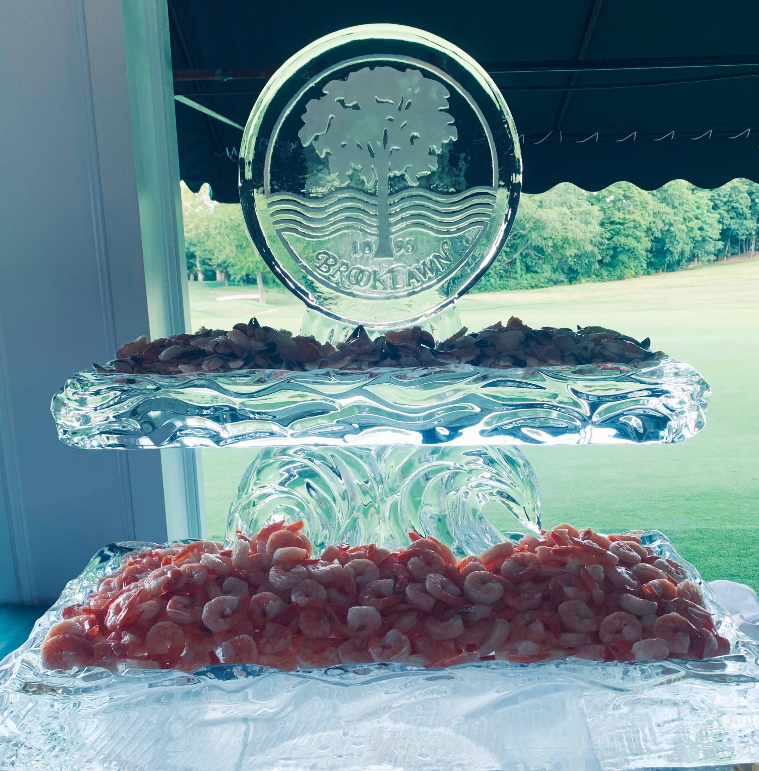 Outdoor round logo ice sculpture centerpiece