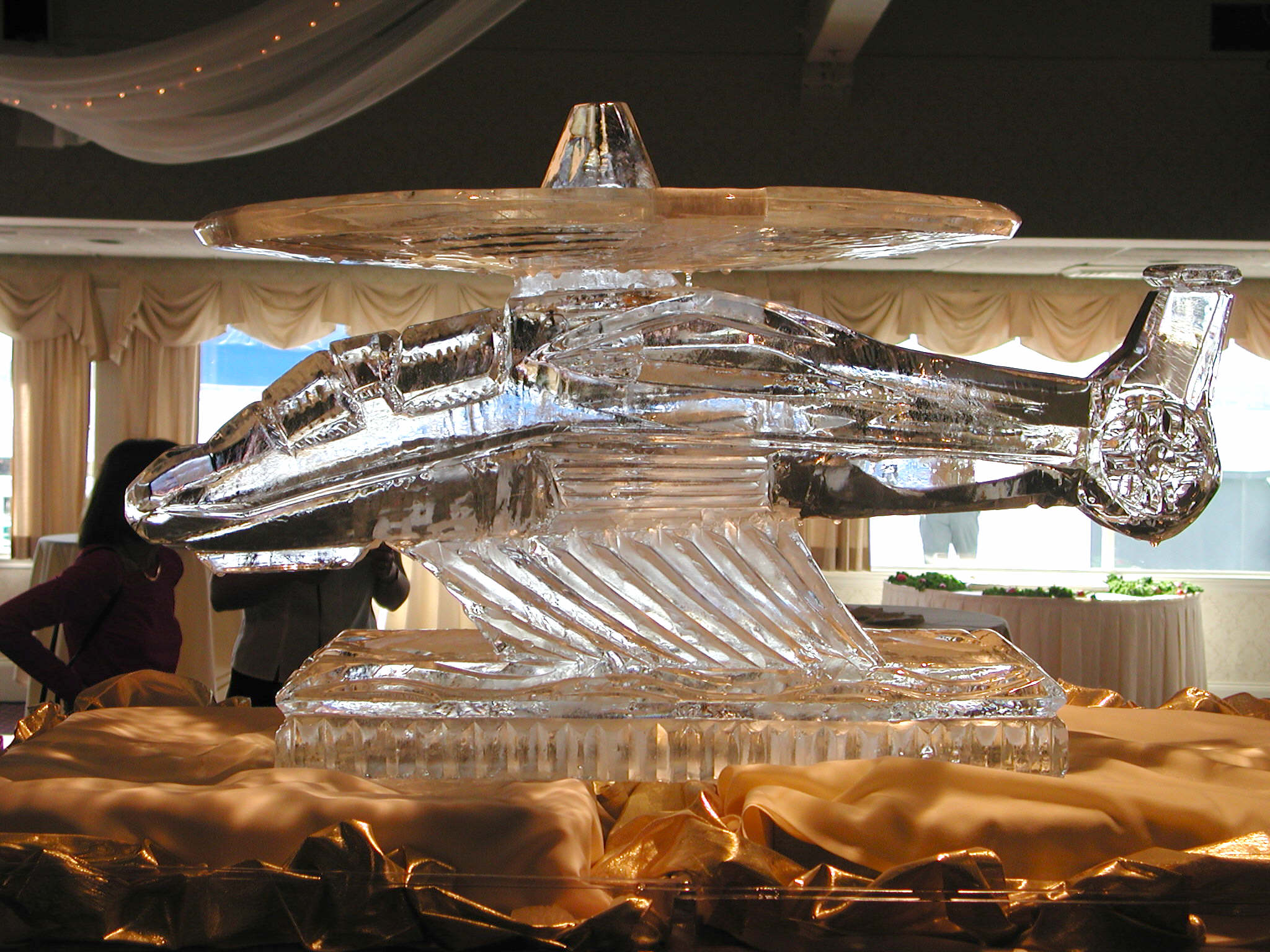 Custom engraved ice sculpture featuring script names and detailing