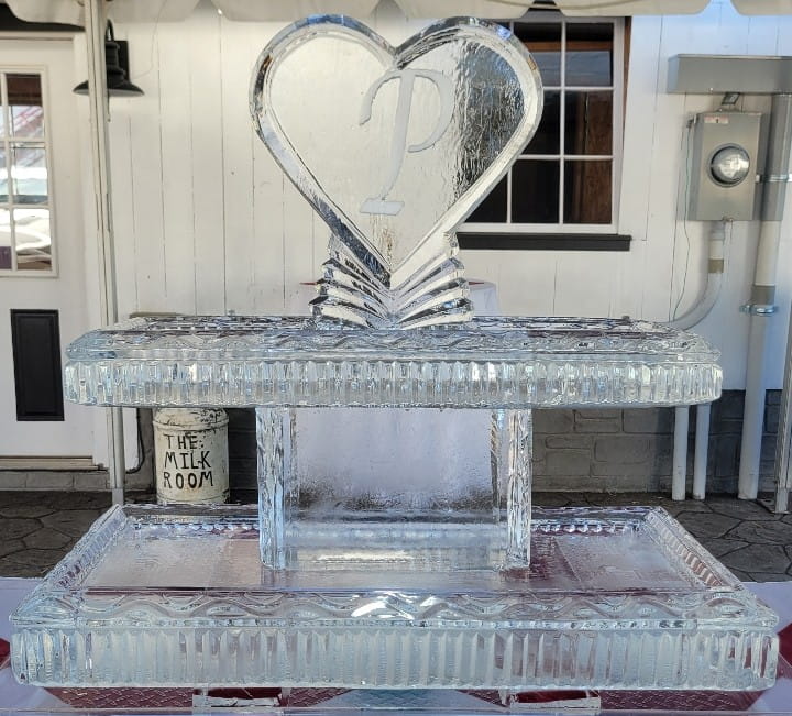 Heart-shaped wedding ice sculpture centerpiece