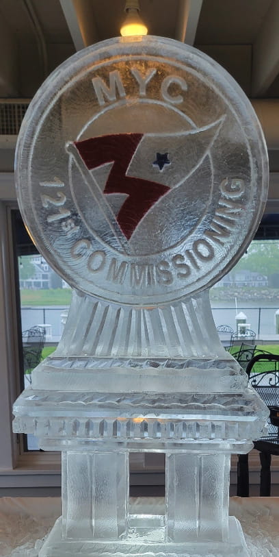 Custom corporate logo ice sculpture celebrating commissioning milestones