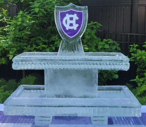 Purple shield logo engraved ice sculpture