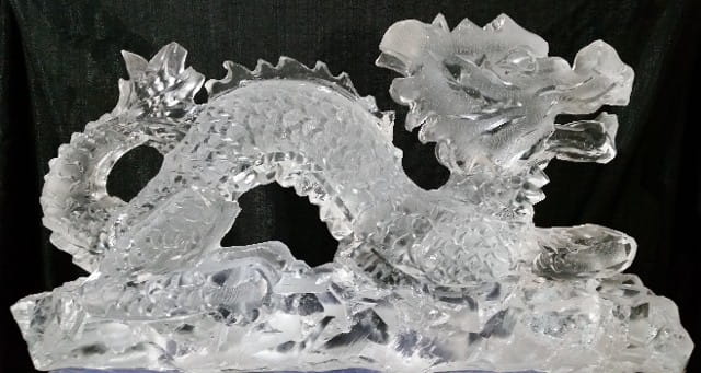 Dragon ice sculpture with curled tail